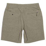 Green shorts with a visible brand logo on a white background