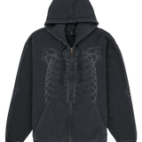 Black hoodie with intricate design on a white background