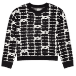 Black and white patterned sweater on a white background