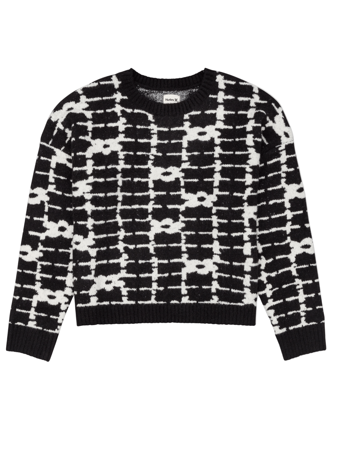 Black and white patterned sweater on a white background