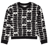 Black and white patterned sweater on a white background