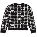 Black and white patterned sweater on a white background