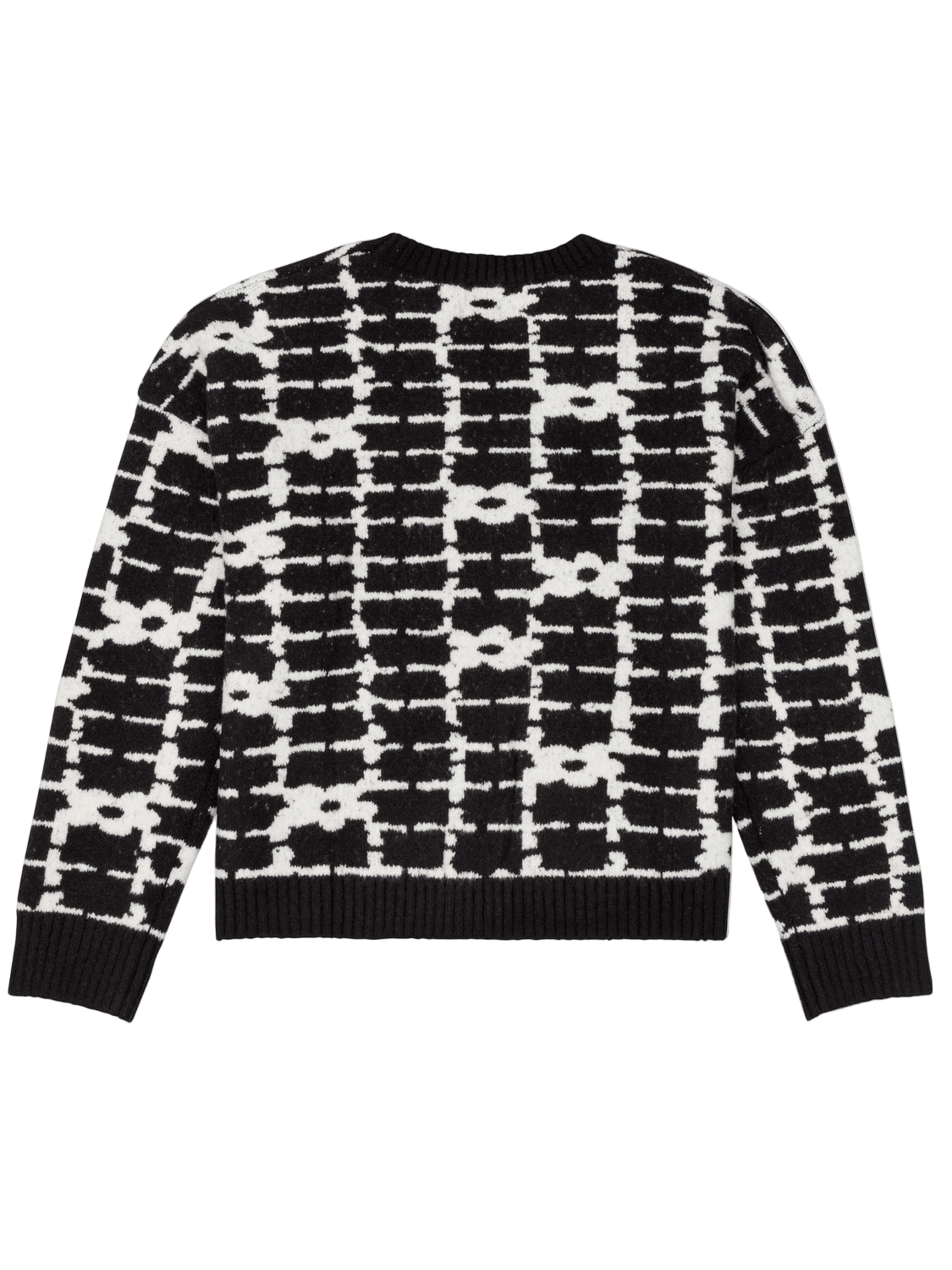 Black and white patterned sweater on a white background