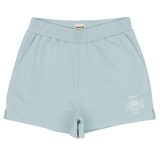 Light blue shorts with a brand logo on a white background